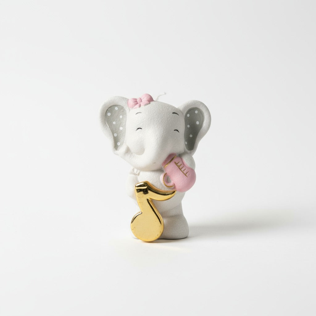Elefante rosa con nota musicale